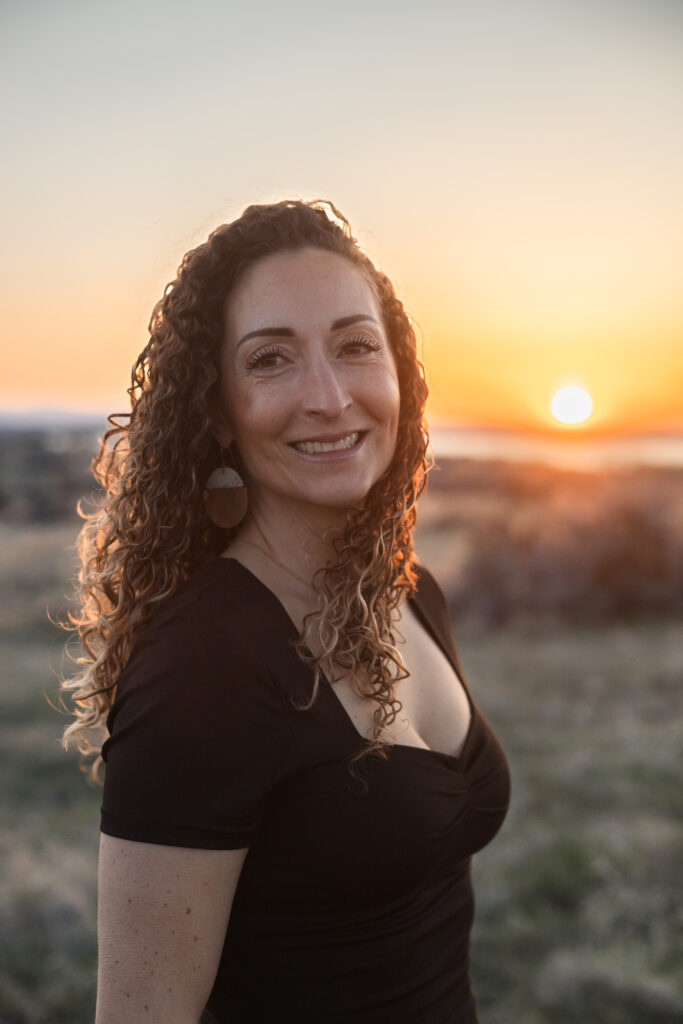 Miriam with the sun in the background